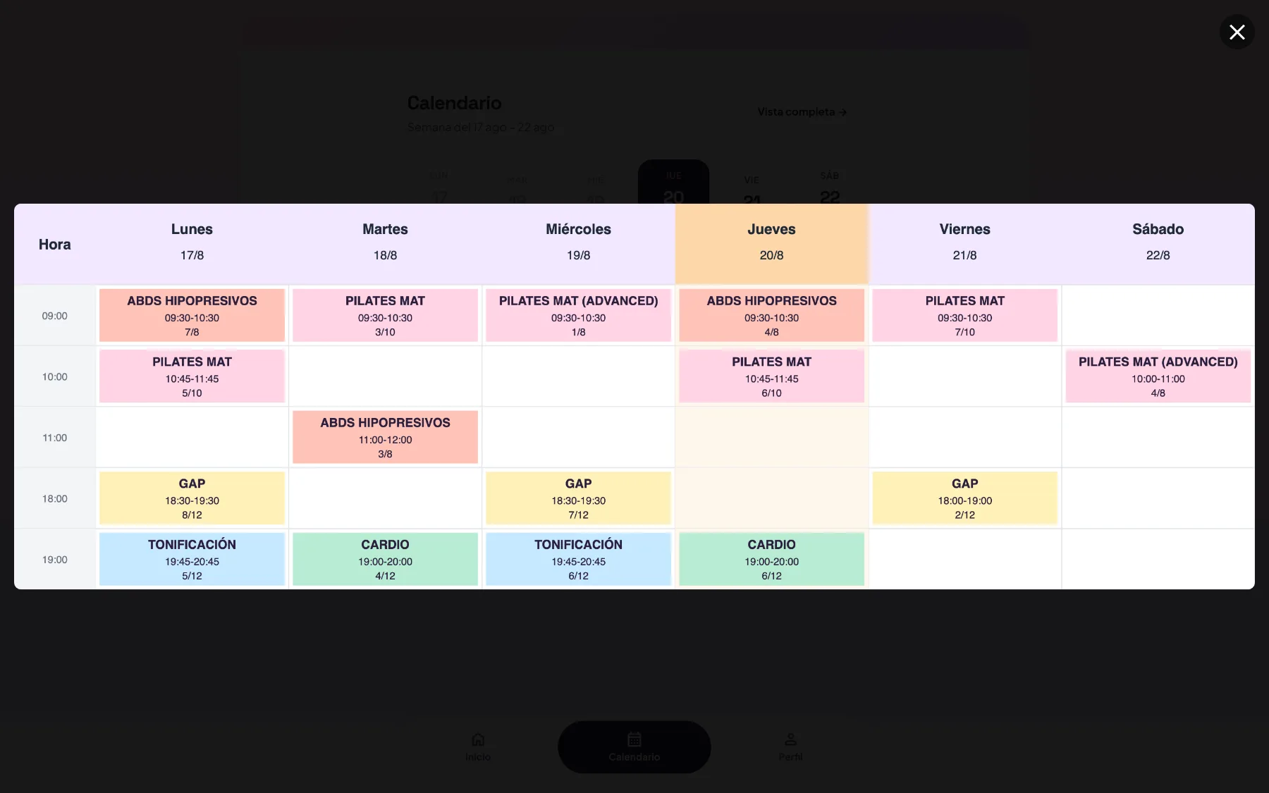 Member booking app full week view with live occupancy per class